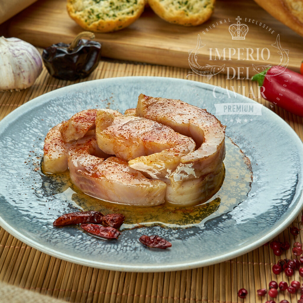 Trozos de filete de omul (Coregonus autumnalis) con aceite y chile(Congelado)
