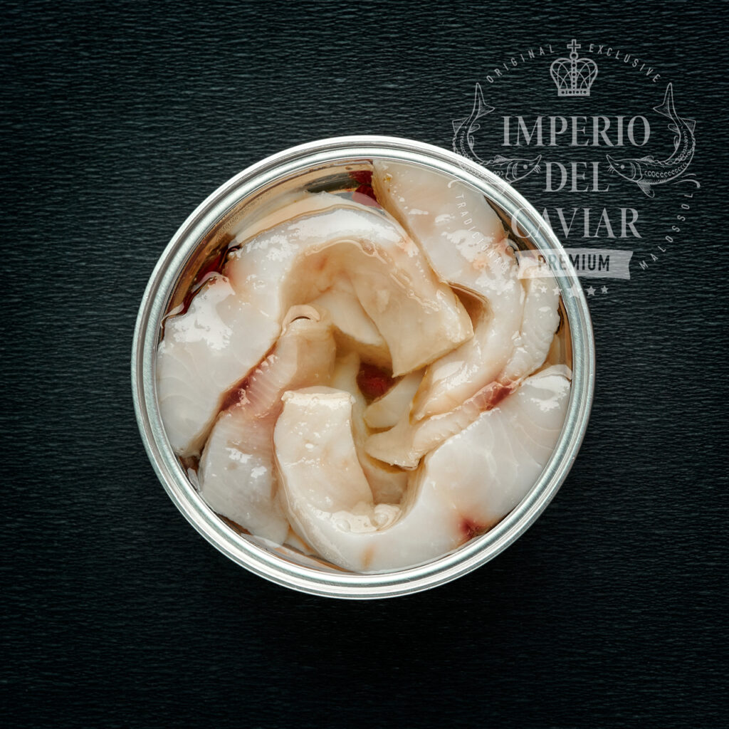 Trozos de filete de Muksun(Coregonus muksun) con aceite y granada (Congelado)